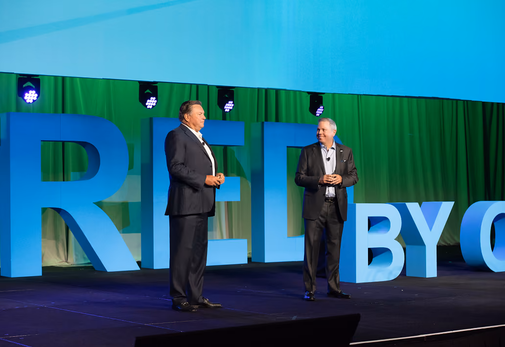 Joe Adams introduces Brian Becker as the firm’s new managing partner & CEO at the 2022 Owners Meeting.