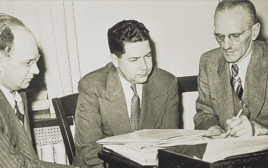 George Hansen, Keith Dunn and Ira B. McGladrey working together in 1945.